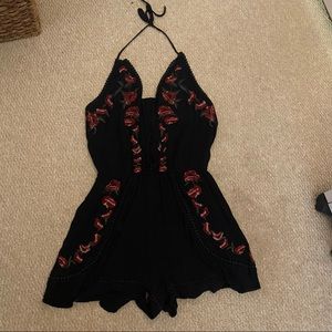 American Eagle black floral rose romper size M